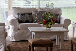 White Upholstered Love Seat